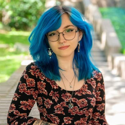 Portrait of Rhiannon Ferguson, Youth Development Coordinator at E4 Youth and UT Austin graduate.
